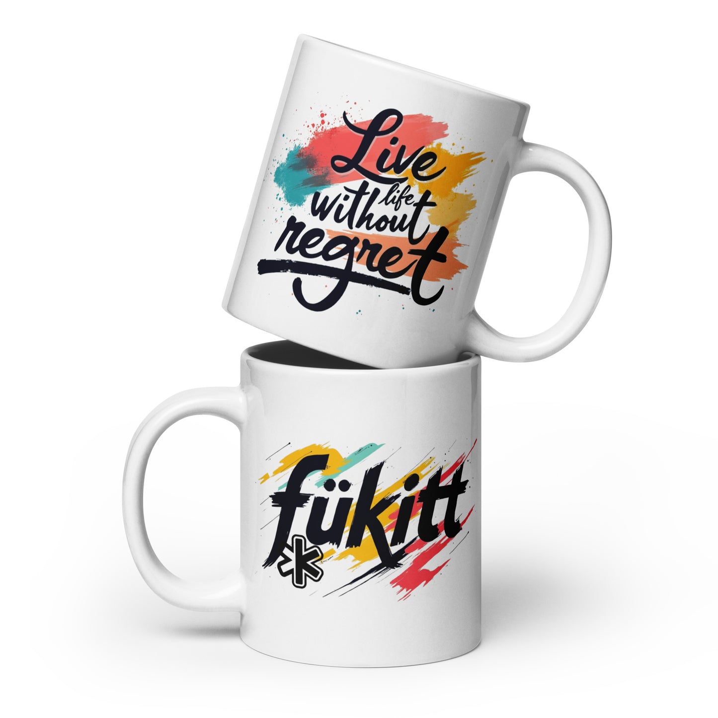 White ceramic mug with Fükitt logo in bold watercolor design on one side and the quote "Live life without regret" on the other, standing upright.
